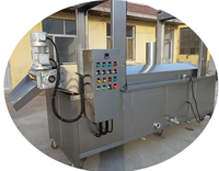 Continuous frying machine